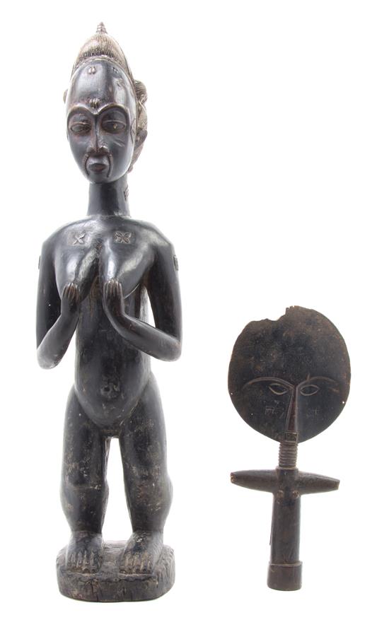 Appraisal: Sale Lot Two African Carved Wood Figures the first depicting