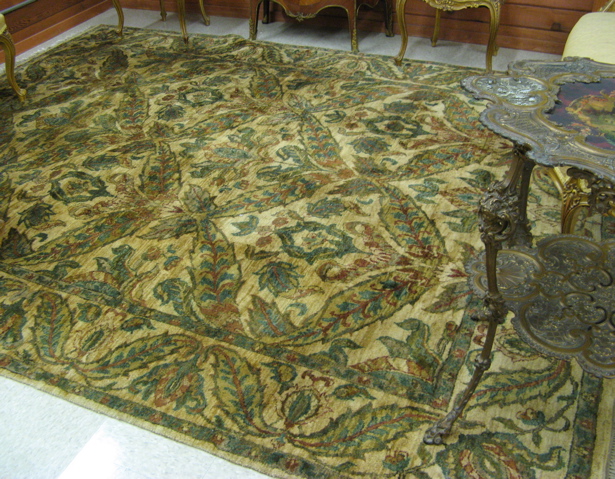 Appraisal: HAND KNOTTED ORIENTAL CARPET hand knotted in an overall foliate