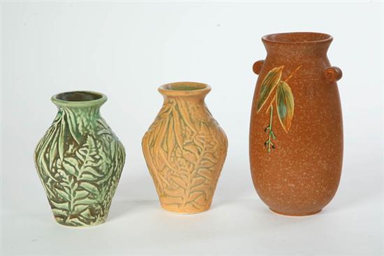 Appraisal: THREE ART POTTERY VASES All Weller Two Marvo one green