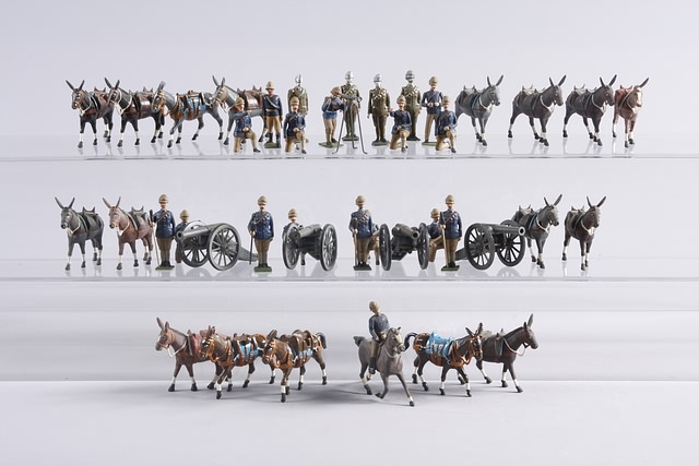 Appraisal: Lot of metal figures mules and guns representing British Mountain