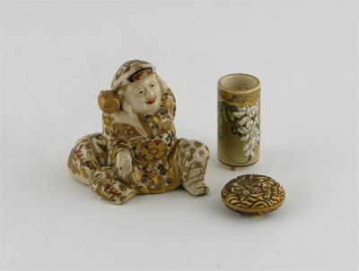 Appraisal: A Japanese Satsuma kneeling figure of Daikoku a small cylindrical