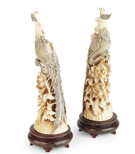 Appraisal: PAIR OF CHINESE IVORY PHOENIXES LATE TH EARLY TH CENTURY