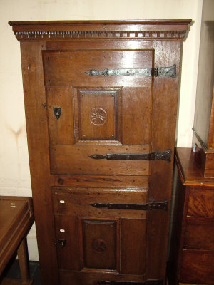 Appraisal: An oak cupboard th century of rectangular form the moulded