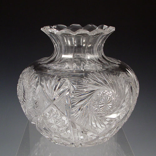 Appraisal: CLARKE AMERICAN BRILLIANT CUT GLASS FLOWER CENTER VASE Scallop rim