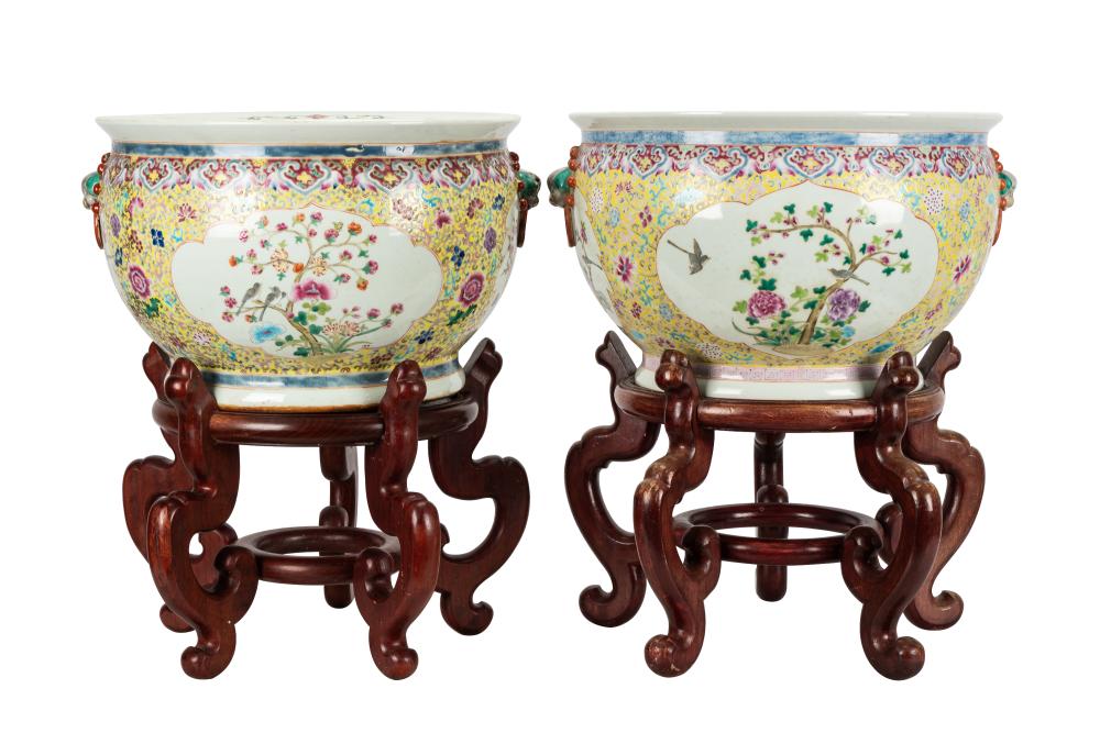 Appraisal: PAIR CHINESE YELLOW GROUND PORCELAIN PLANTERSunsigned with foo dog mounts