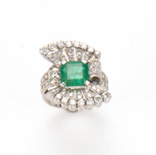 Appraisal: An emerald diamond and platinum spray ring circa - 's