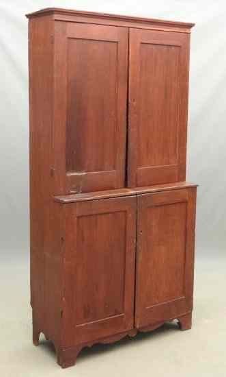 Appraisal: th c four door bracket base stepback cupboard in old