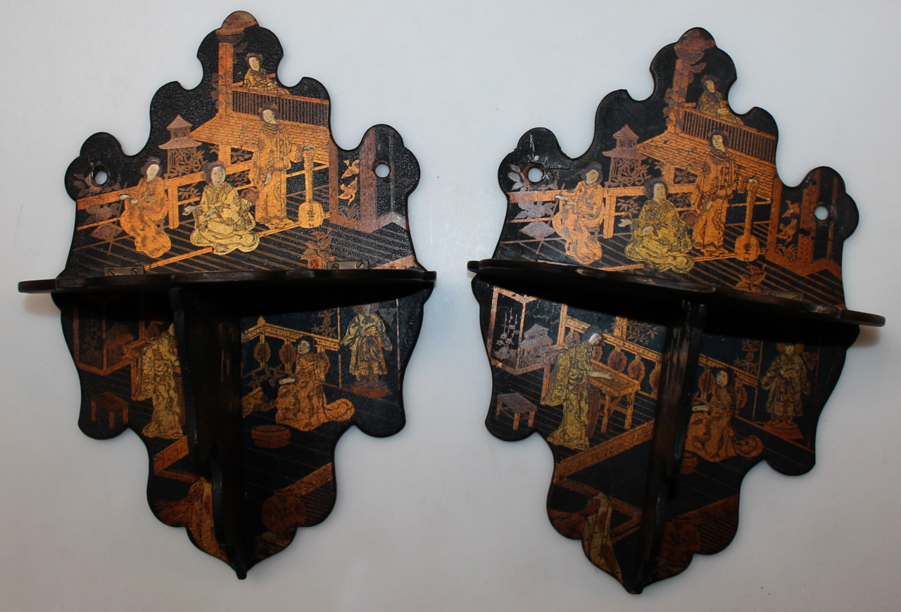 Appraisal: A pair of early thC Japanese black lacquered shelves gilt