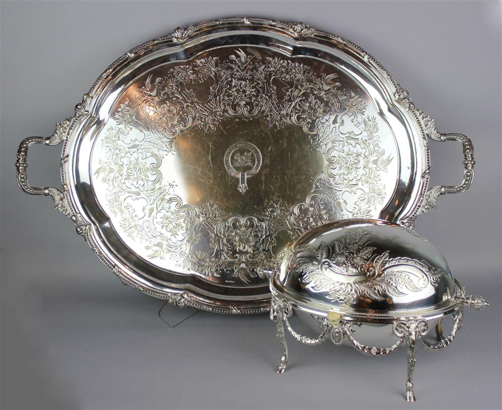 Appraisal: SILVERPLATED TWO-HANDLED SERVING TRAY AND SILVERPLATED BISCUIT SERVER the tray