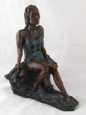 Appraisal: A bronze figure of a woman in a bathing costume