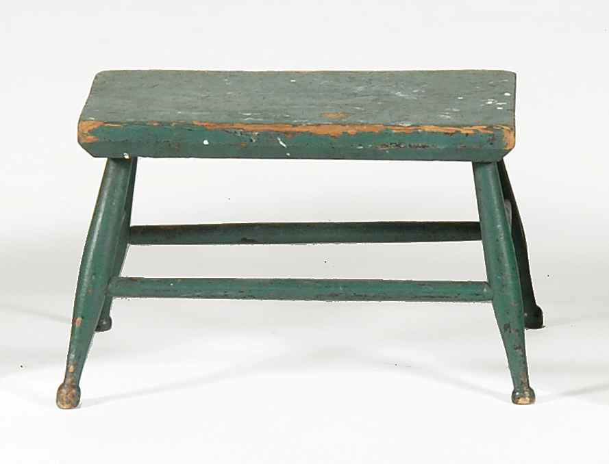 Appraisal: ANTIQUE AMERICAN FOOTSTOOL In pine with original green paint Turned