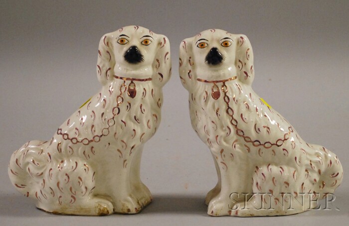 Appraisal: Pair of English Pink Lustre Staffordshire Seated Spaniels ht in