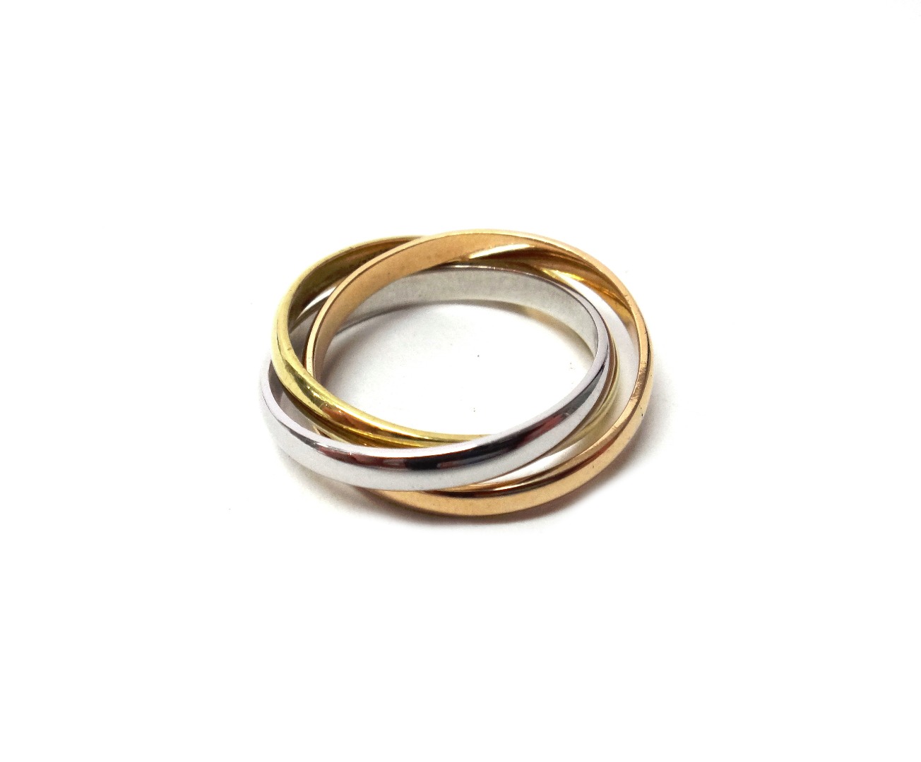 Appraisal: A three colour gold 'Trinity' or Russian style wedding ring