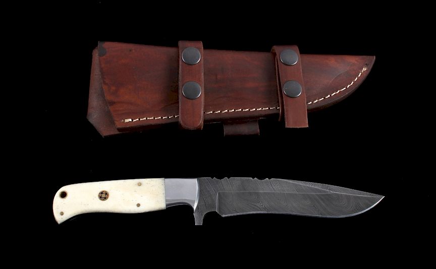 Appraisal: CFK Damascus Exotic Camel Bone Knife Scabbard This is a