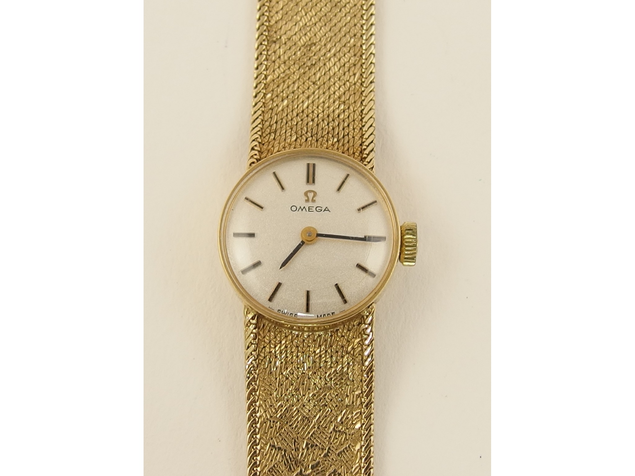 Appraisal: A ladies ct Omega wristwatch with integral strap weight approx