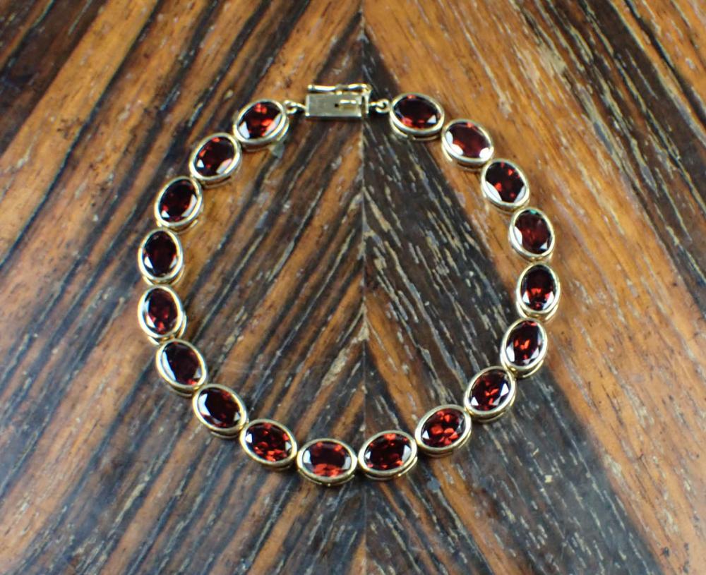 Appraisal: RED GARNET AND YELLOW GOLD BRACELET The - k yellow