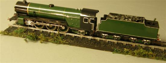 Appraisal: Model of a coal powered steam locomotive and tender green