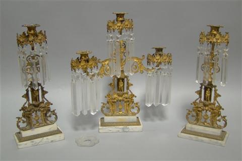 Appraisal: GARNITURE OF THREE LUSTRES Third quarter th century with foliate