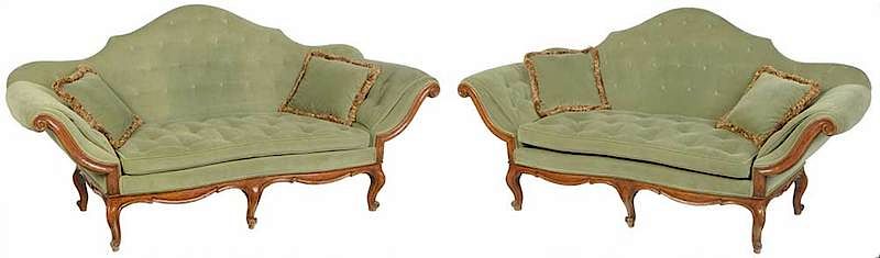 Appraisal: Pair Venetian Rococo Style Carved Walnut Sofas th century exuberant