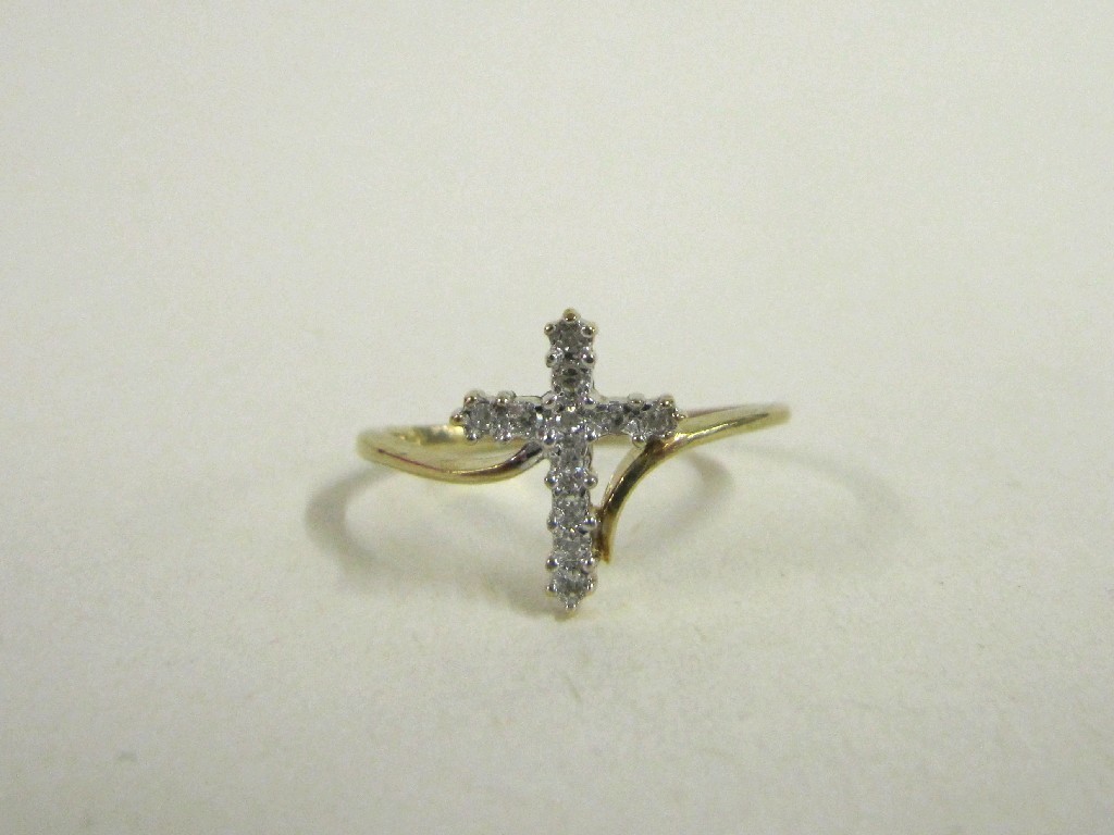 Appraisal: Nine carat gold diamond set cross ring