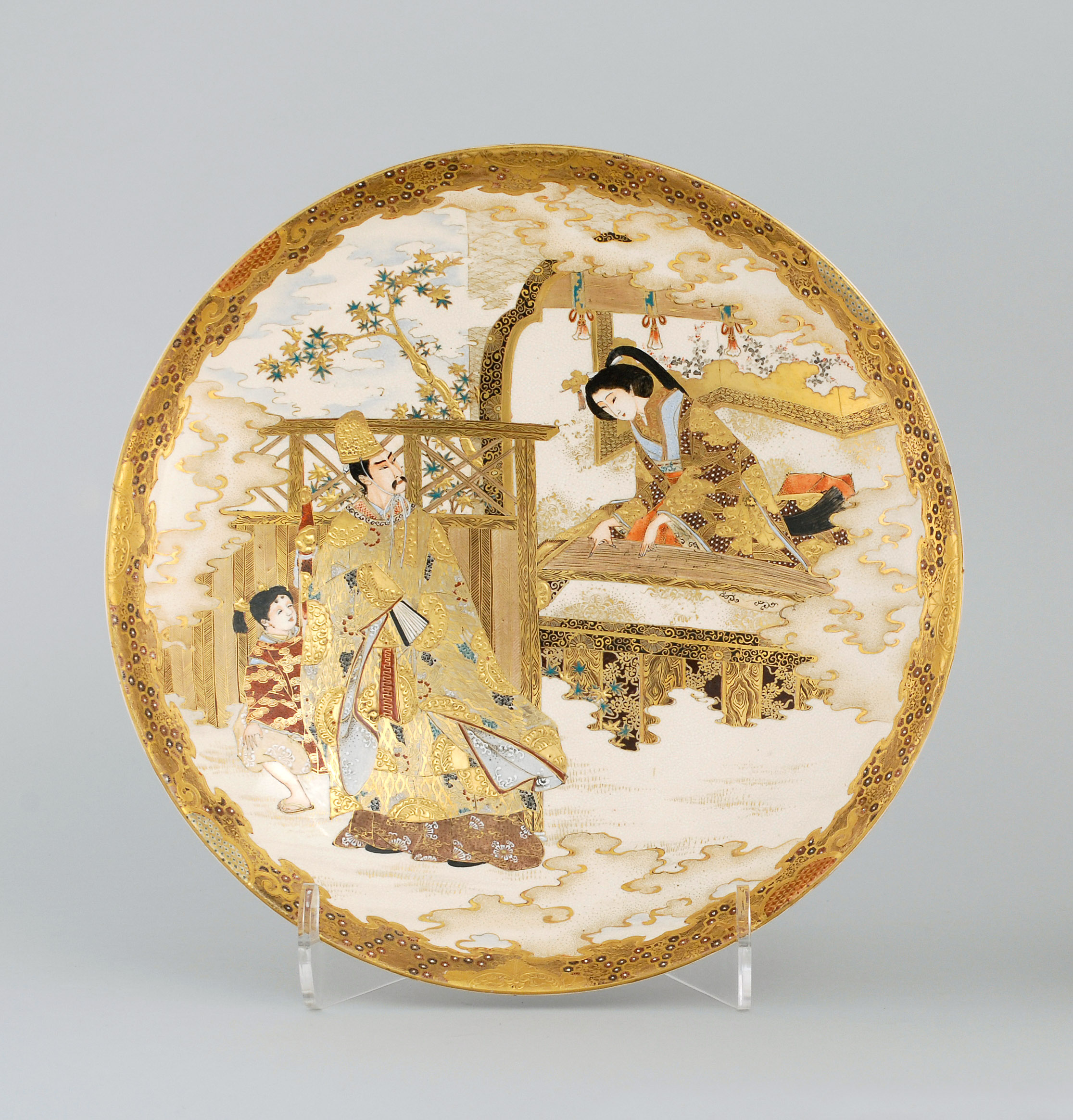 Appraisal: SATSUMA POTTERY PLATE Meiji PeriodWith decoration of a woman playing