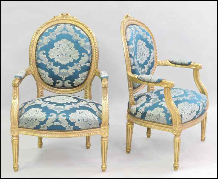 Appraisal: PAIR OF LOUIS XVI GILTWOOD OPEN ARMCHAIRS Back height ''