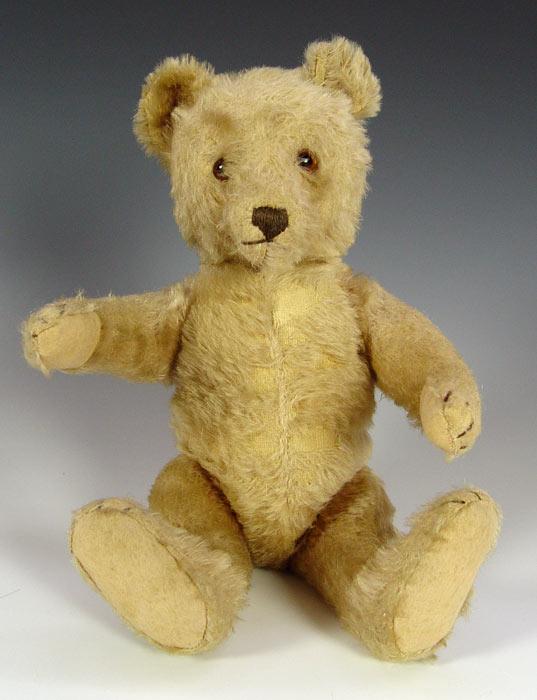 Appraisal: ANTIQUE MOHAIR TEDDY BEAR Swivel head jointed at arms and