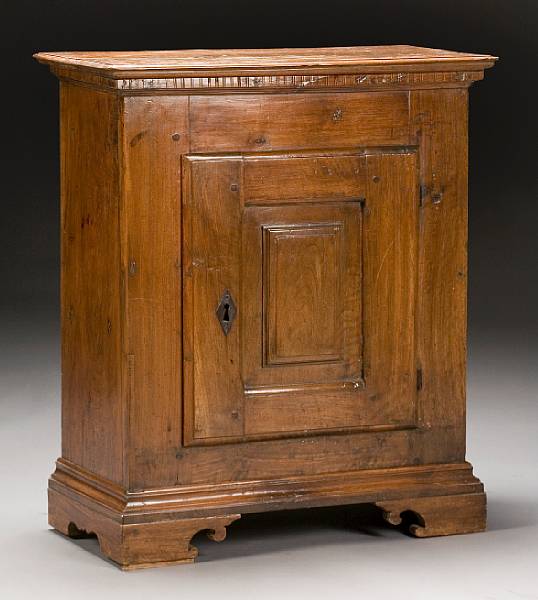 Appraisal: An Italian Baroque walnut cabinet th century The rectangular top