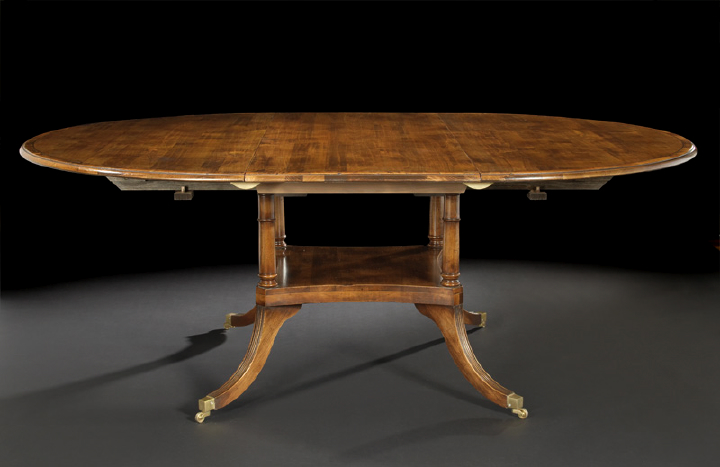 Appraisal: Regency-Style Mahoganized Wooden Center Table the circular top consisting of