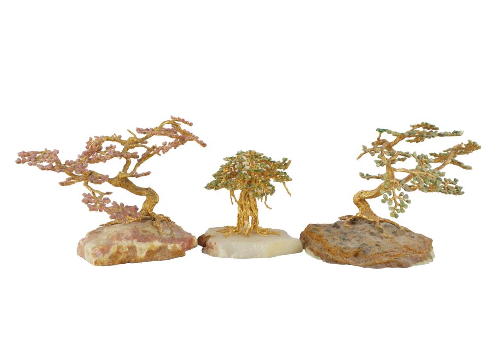 Appraisal: THREE GILT METAL STONE TABLE ORNAMENTSunsigned each naturalistically modeled as