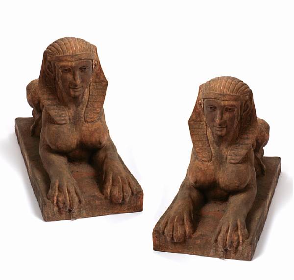 Appraisal: A pair of terracotta models of recumbent sphinxes height in