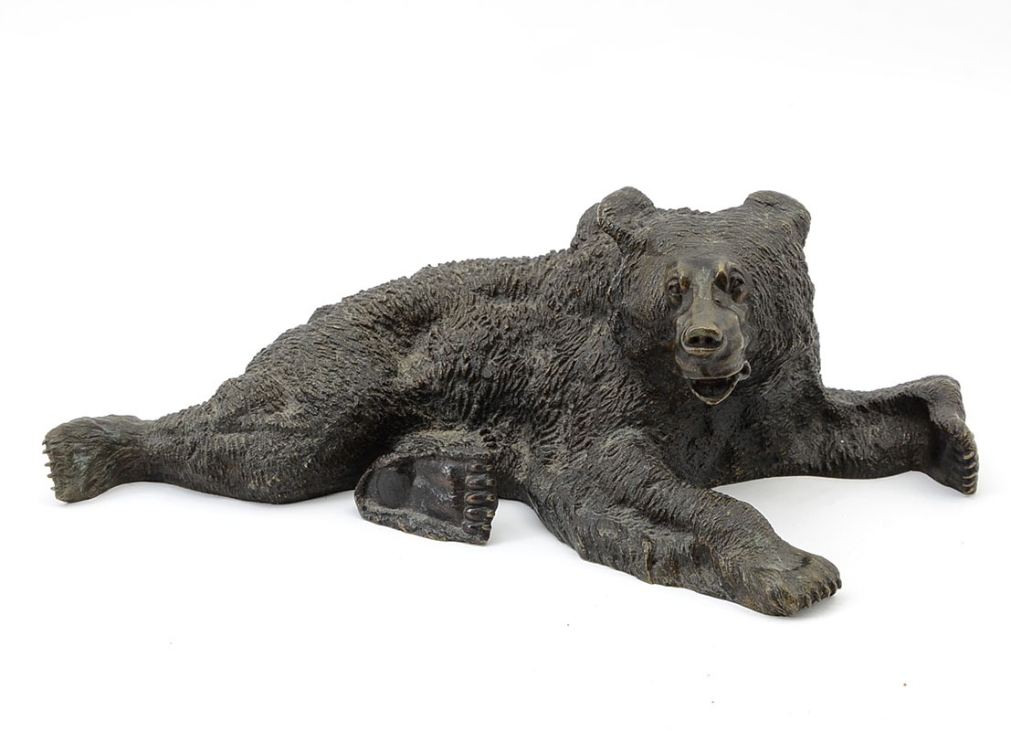 Appraisal: BRONZE RECLINING BEAR '' x '' no visible signature probably