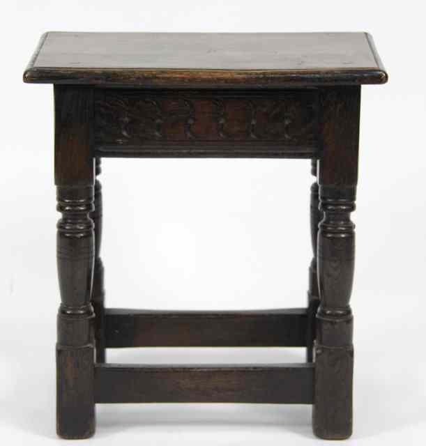 Appraisal: An oak joint stool of Jacobean design on baluster turned