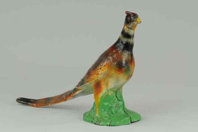 Appraisal: PHEASANT DOORSTOP Very rare cast iron full figured pheasant with