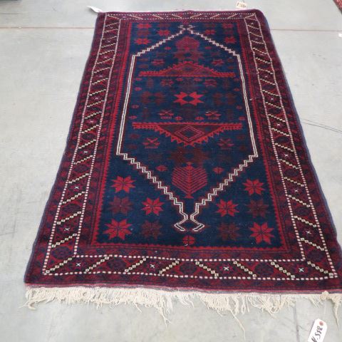 Appraisal: Yagcibedir Turkish Handmade Rug geometric designs on indigio field Western