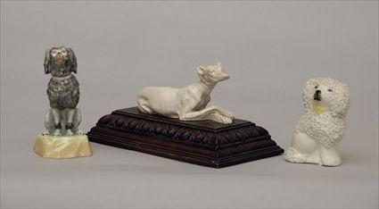 Appraisal: Group of Three Dog-Form Figures Provenance from the Estate of