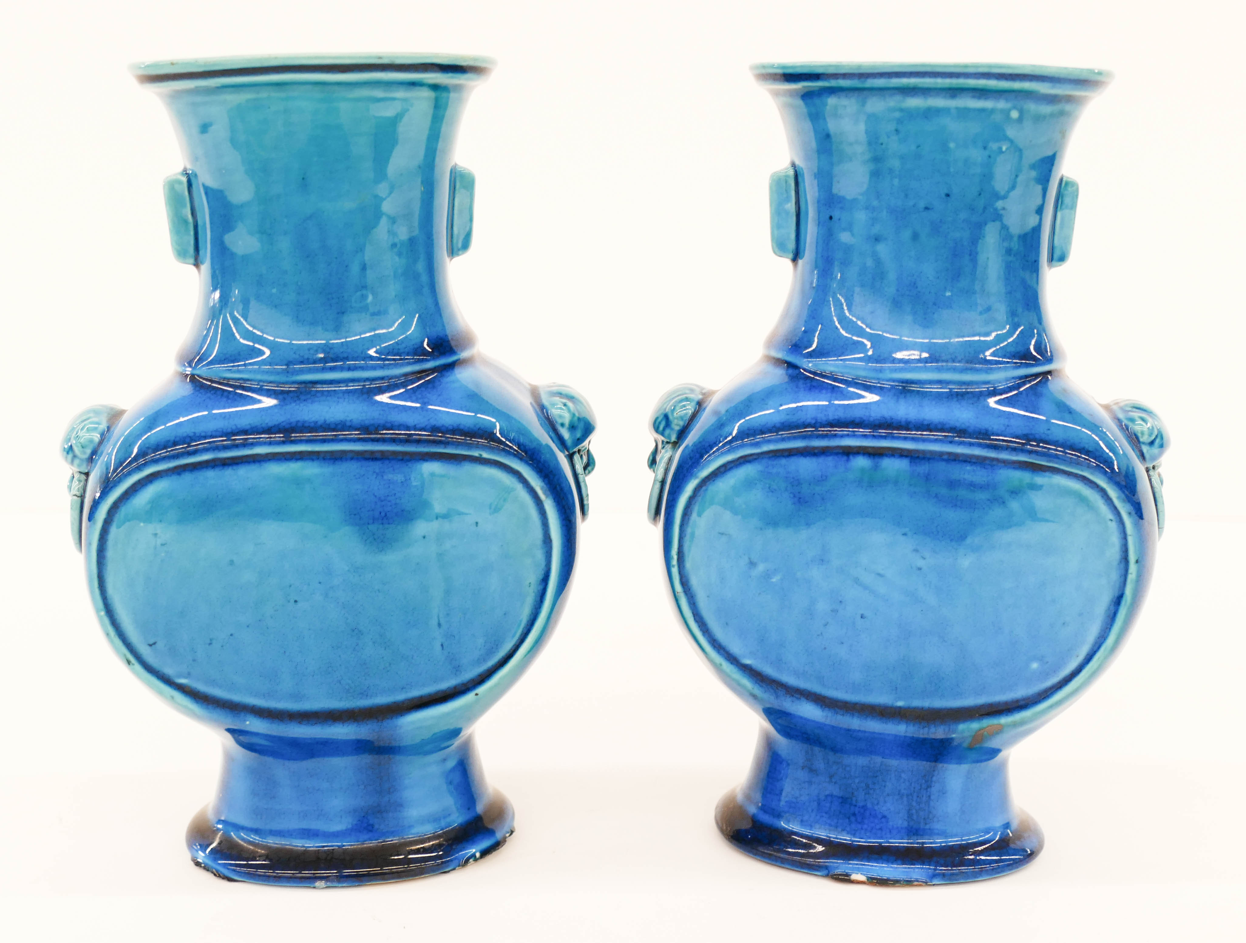 Appraisal: Pair Chinese Qing Peacock Blue Hu Vases ''x '' Deep