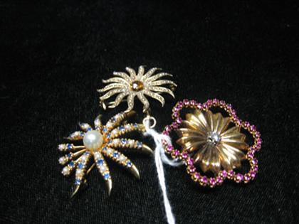 Appraisal: Assortment of three flower-shaped pins with gemstones with pearls and