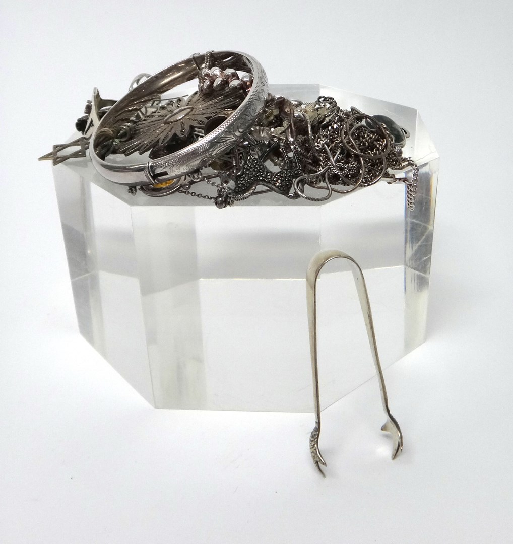 Appraisal: Mostly silver jewellery including a charm bracelet two marcasite set