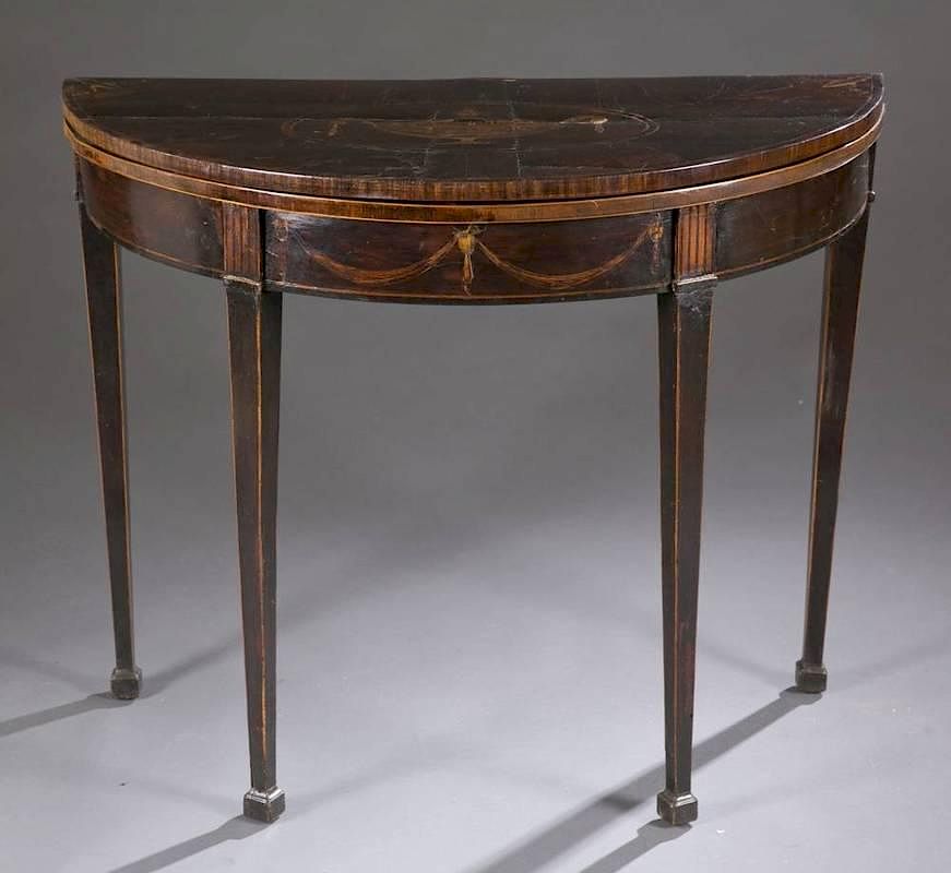 Appraisal: Inlaid demilune table An inlaid demilune table Early th c