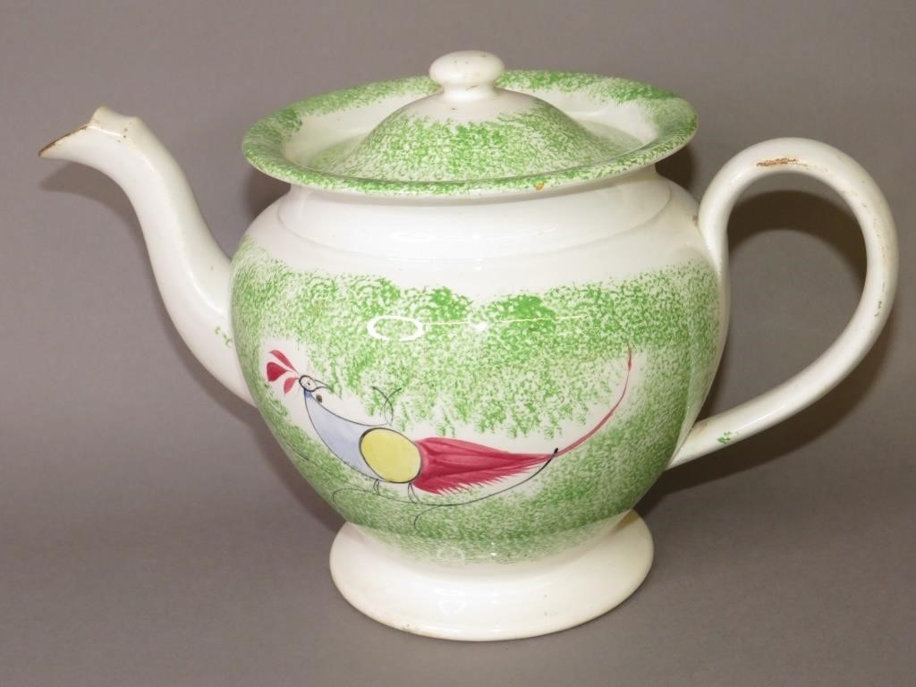 Appraisal: GREEN SPATTER PEAFOWL PATTERN COVERED TEAPOTca baluster form covered teapot