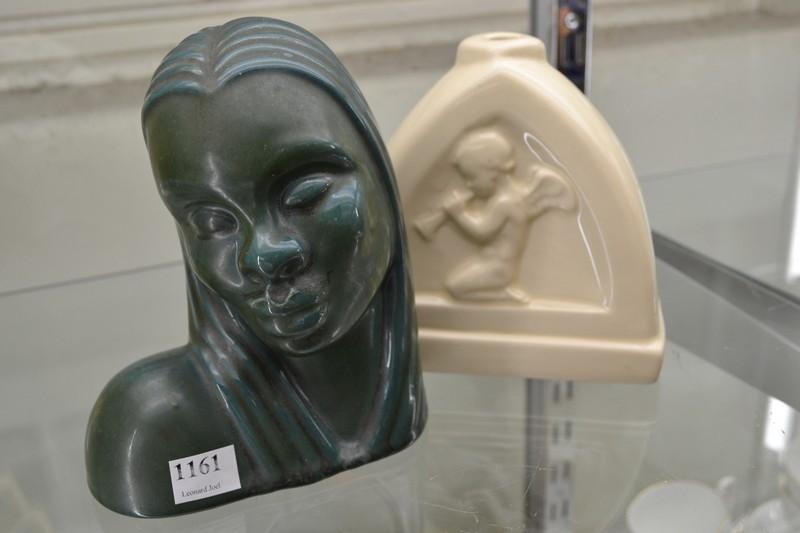 Appraisal: AUSTRALIAN POTTERY AFRICAN WOMAN BUST AND ONE OTHER