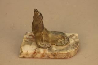 Appraisal: Modern Seal Sculpture Mounted on Marble Base Modern Seal Sculpture