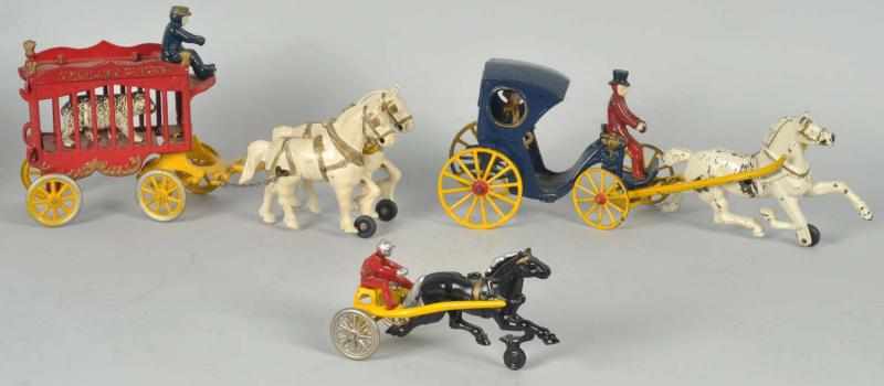 Appraisal: Lot of Cast Iron Kenton Horse-Drawn Toys American Includes one