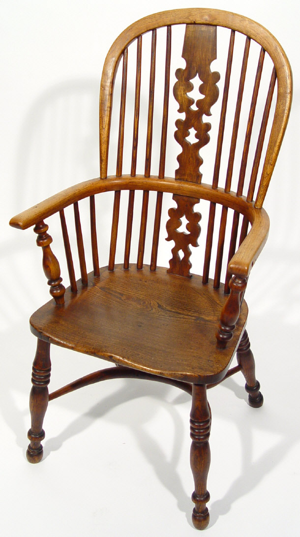 Appraisal: Elm Windsor stickback armchair on turned leg and crinoline stretcher