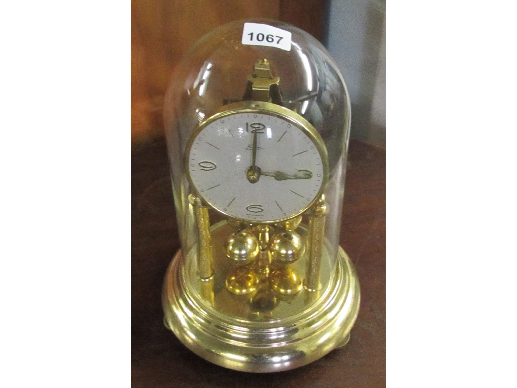 Appraisal: Mantel clock in a glass dome