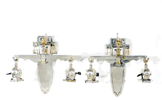 Appraisal: Pair Arts Crafts two-light sconces Bradley Hubbard circa shaped backplate