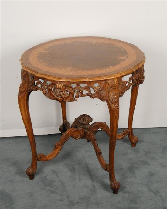 Appraisal: An E th C Marquetried Center Table having a molded