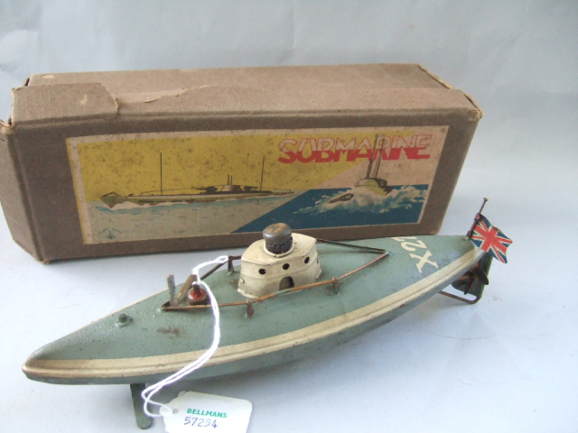 Appraisal: A tin plate submarine box stamped foreign patent and with