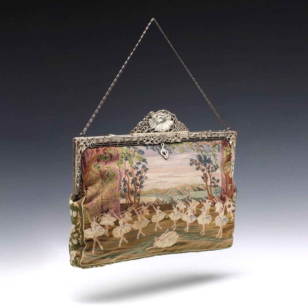 Appraisal: AN EXCEPTIONAL PETTIPOINT PURSE WITH HAND ENGRAVED FRAME The very